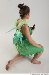 KATERINA KNNELING POSE WITH SWORD